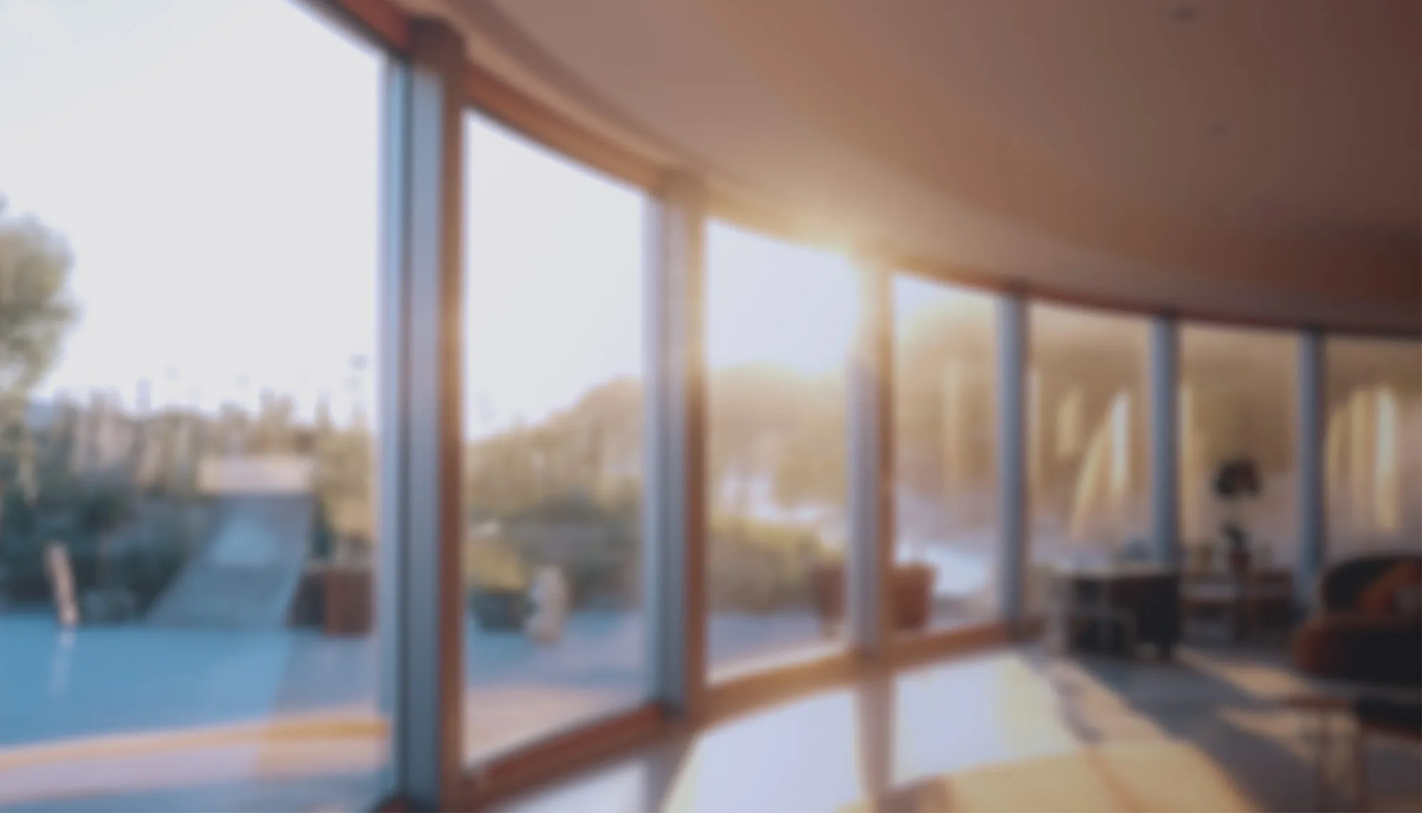 A bright, sunny, modern living room at sunset